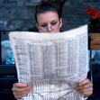 Man reading newspaper